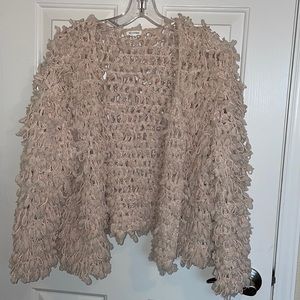 Creme Sweater knitted Cardigan . SZ Large. NEW not worn . Very cute fabric
